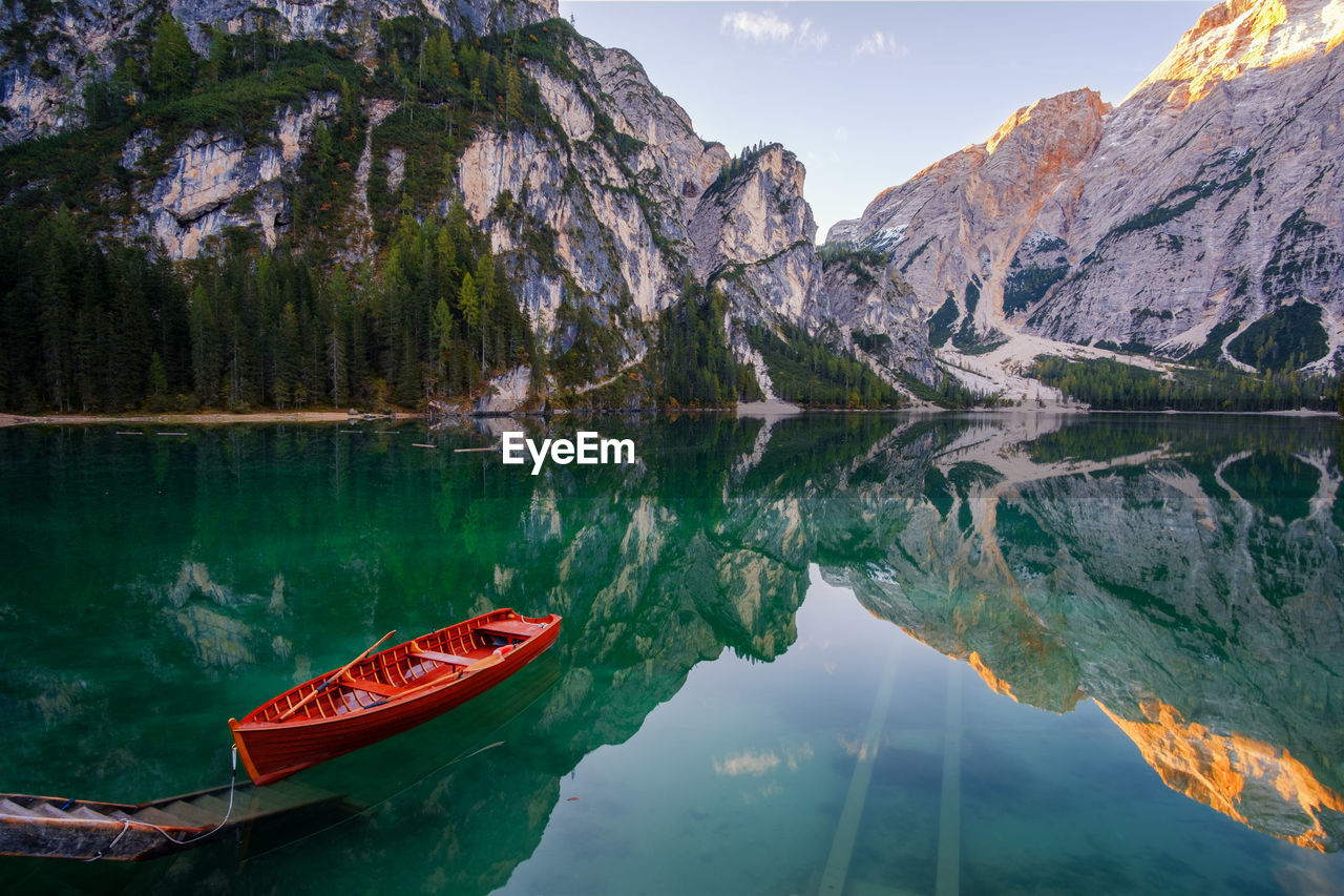 SCENIC VIEW OF LAKE BY MOUNTAIN