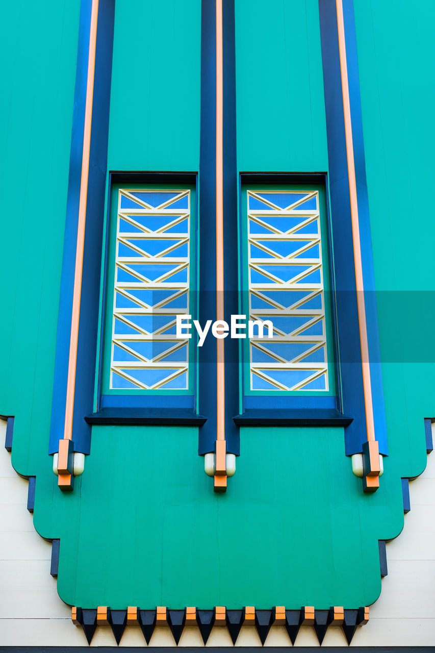 CLOSED BLUE WINDOW ON BUILDING