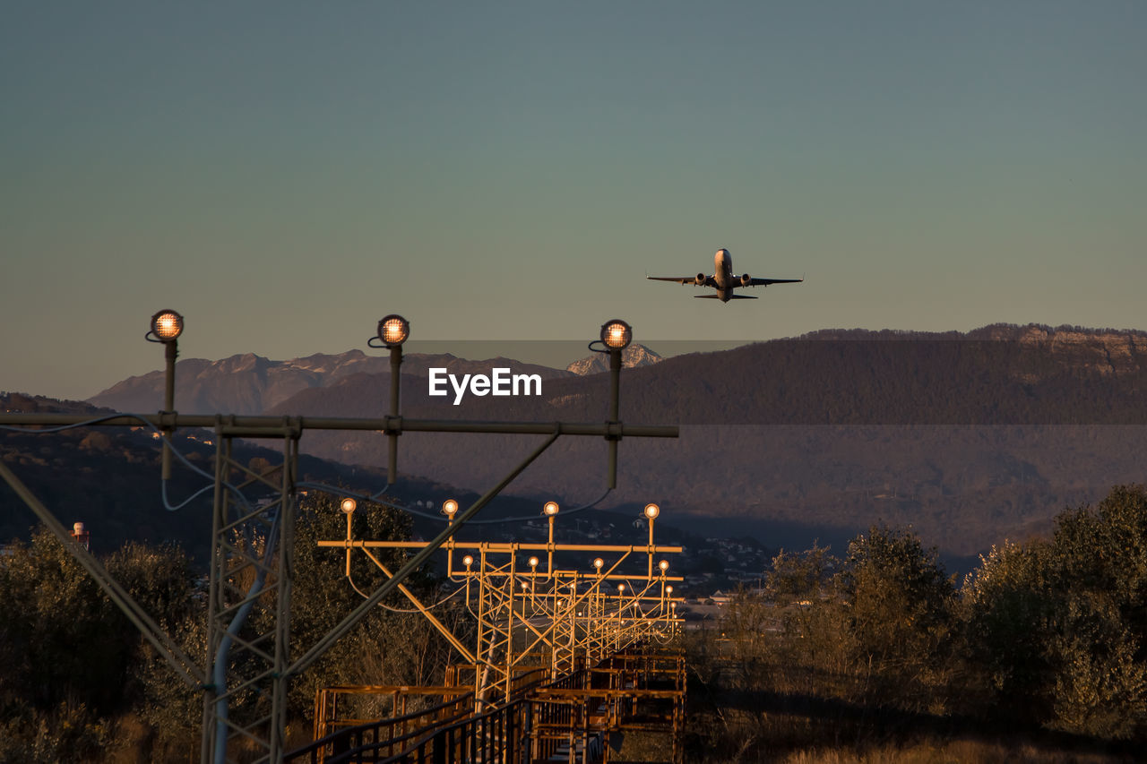 Plane takes off at the airport, air transport, air travel