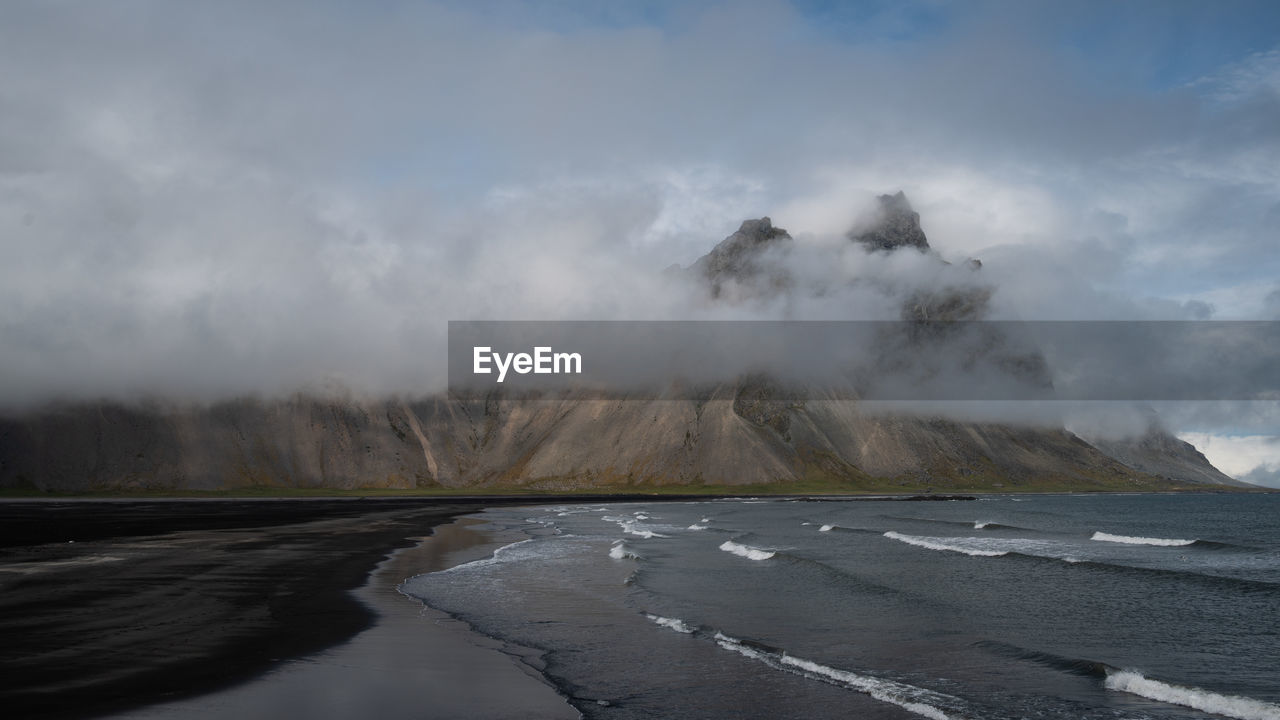 Scenic view of land against sky