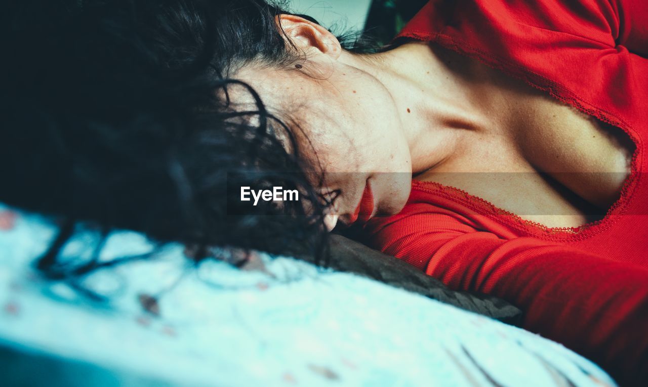 Woman sleeping on bed