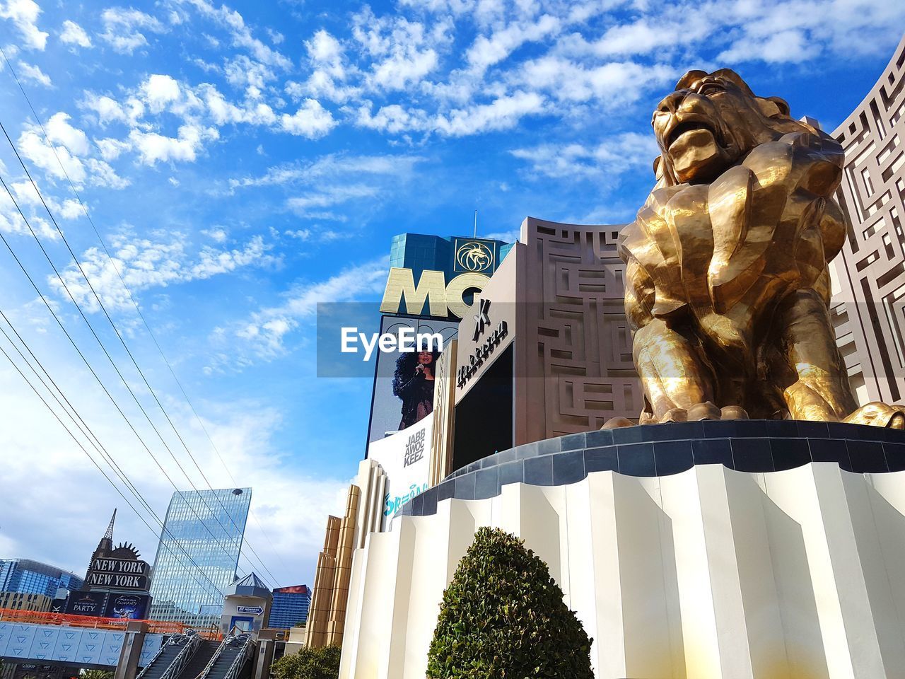 LOW ANGLE VIEW OF STATUE IN CITY