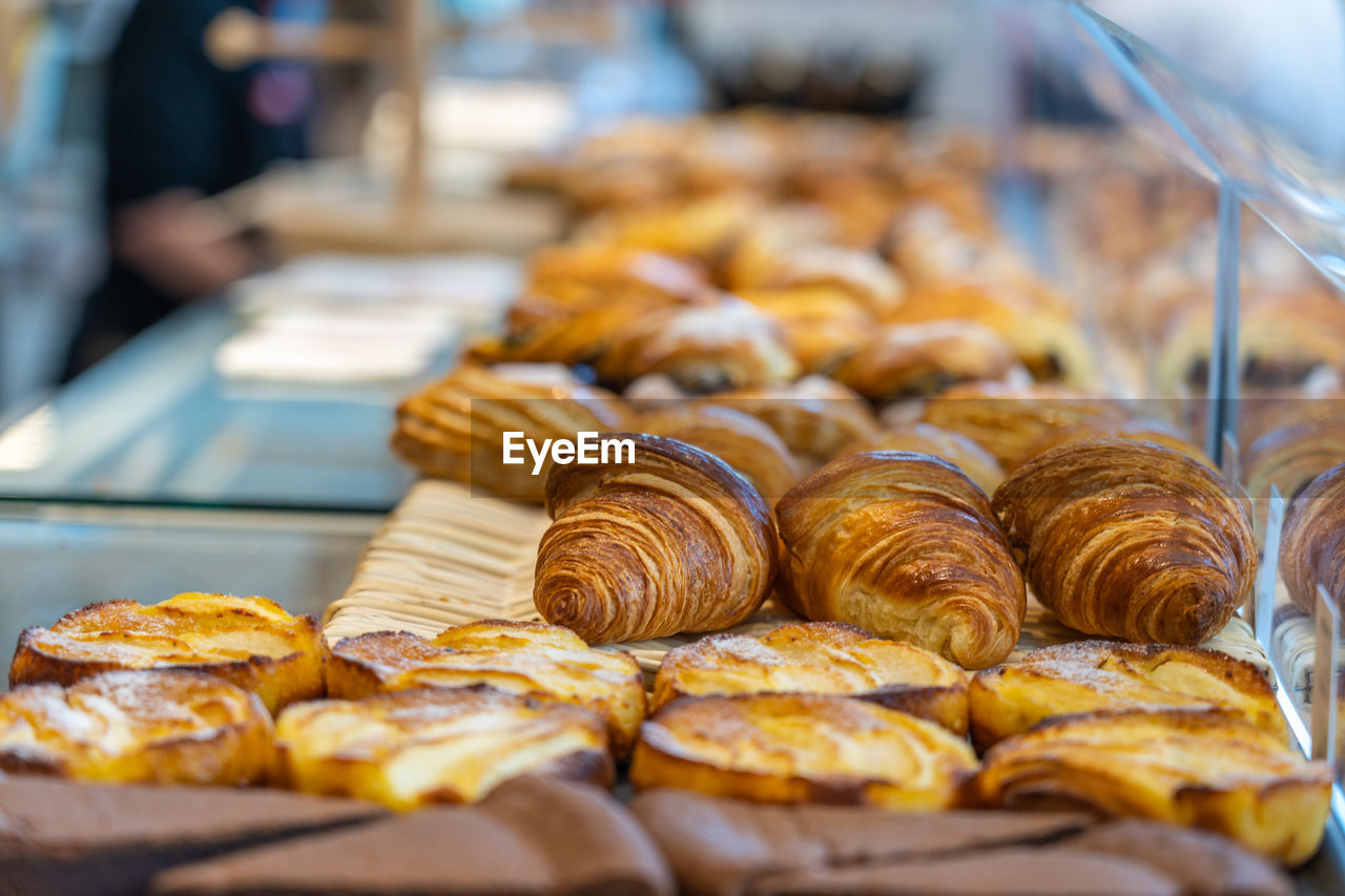 Tasty and beautiful golden croissants and pastry at bakery