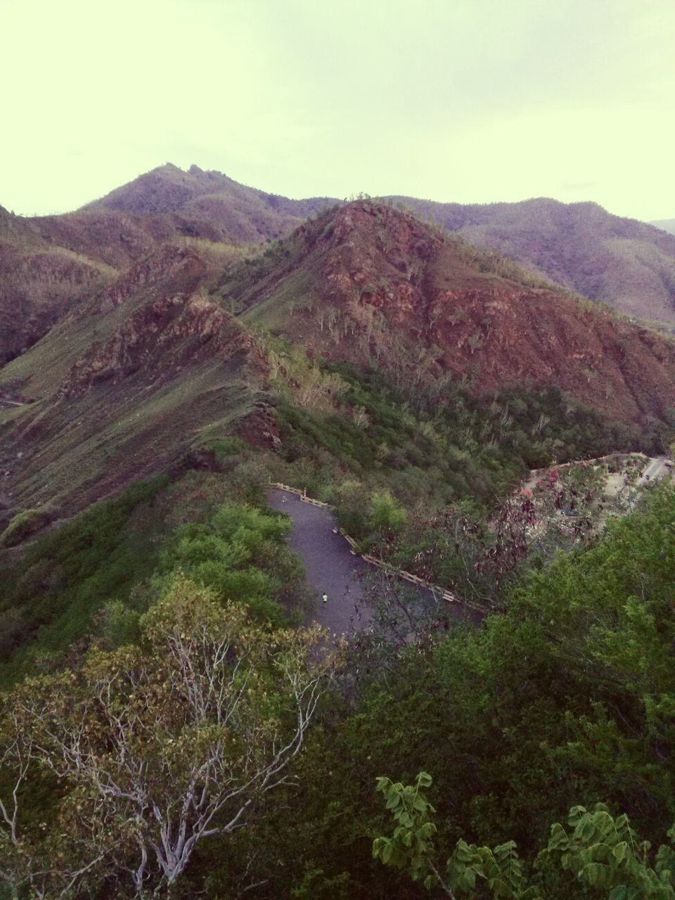 High angle view of road amidst mountains