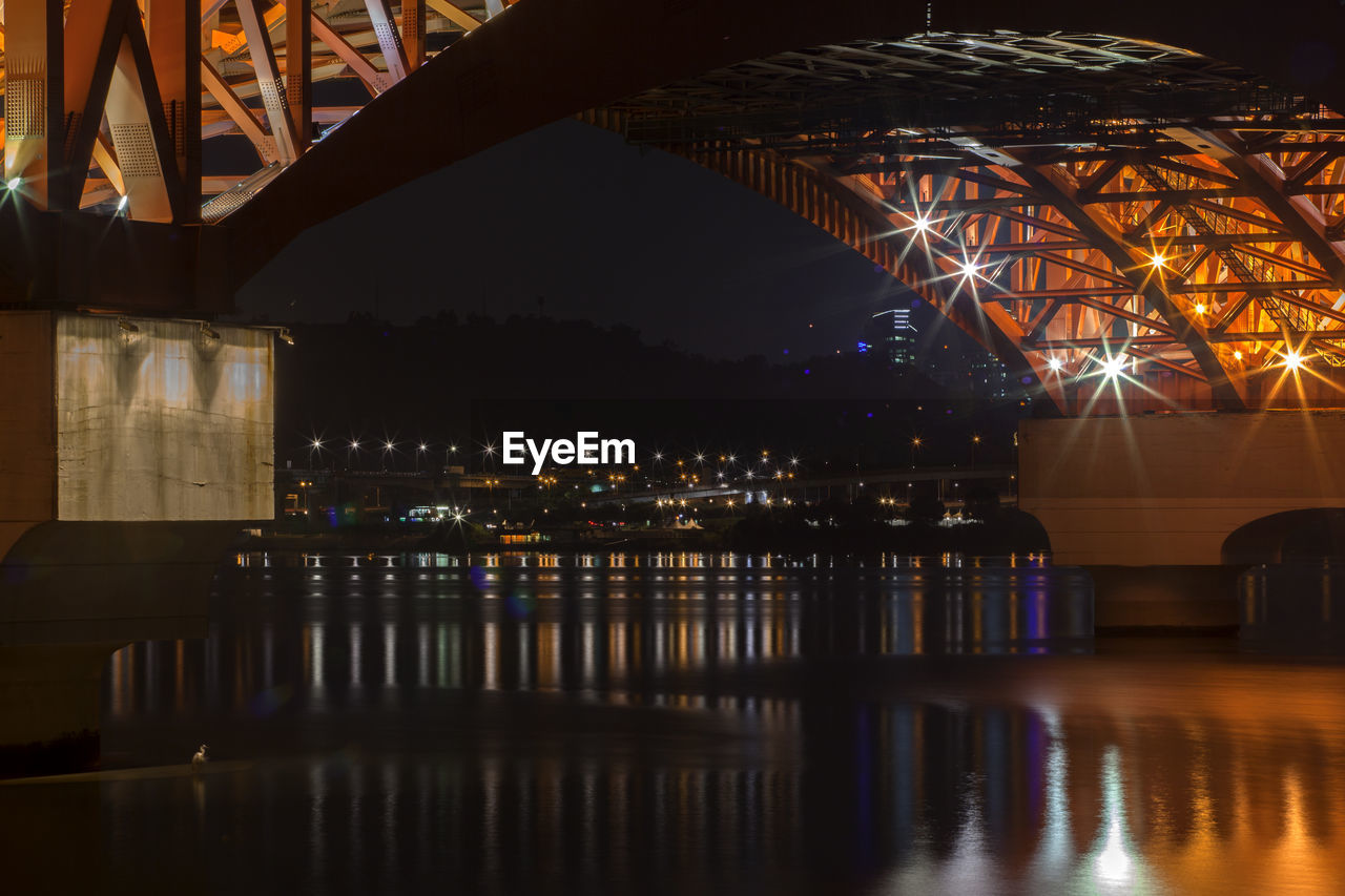 Illuminated han river bridge over river at night