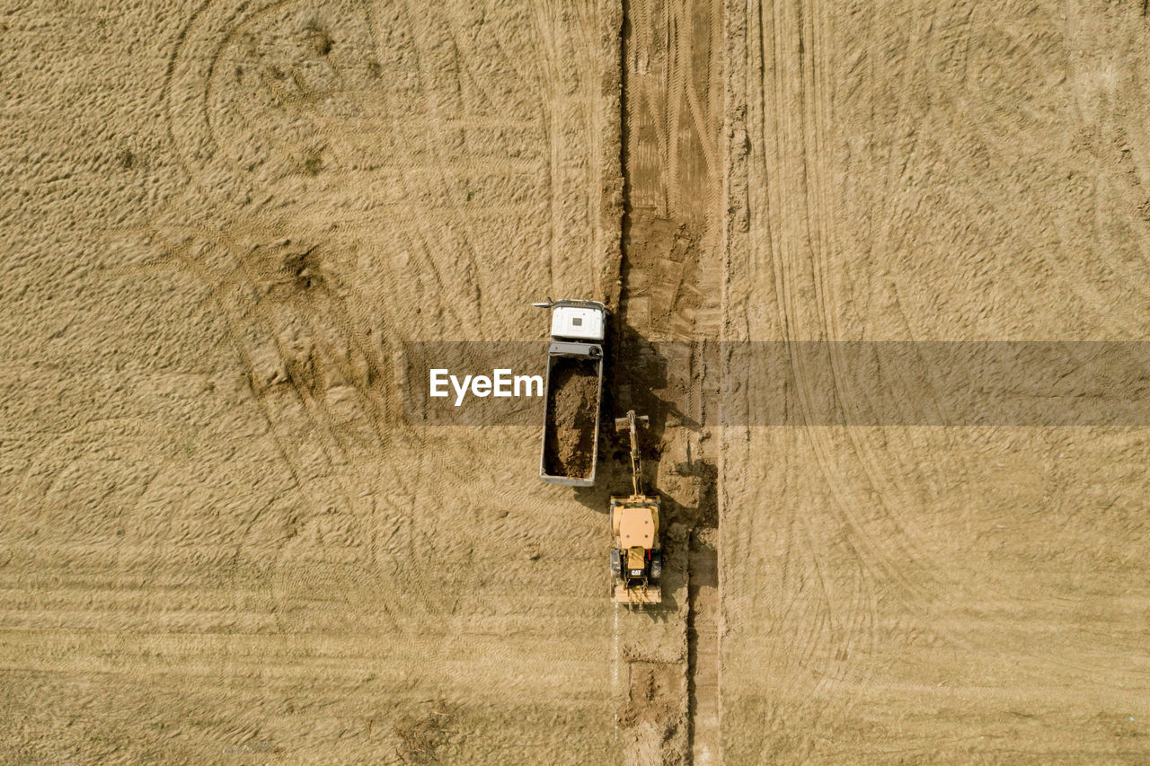 Aerial view of tractor working at farm