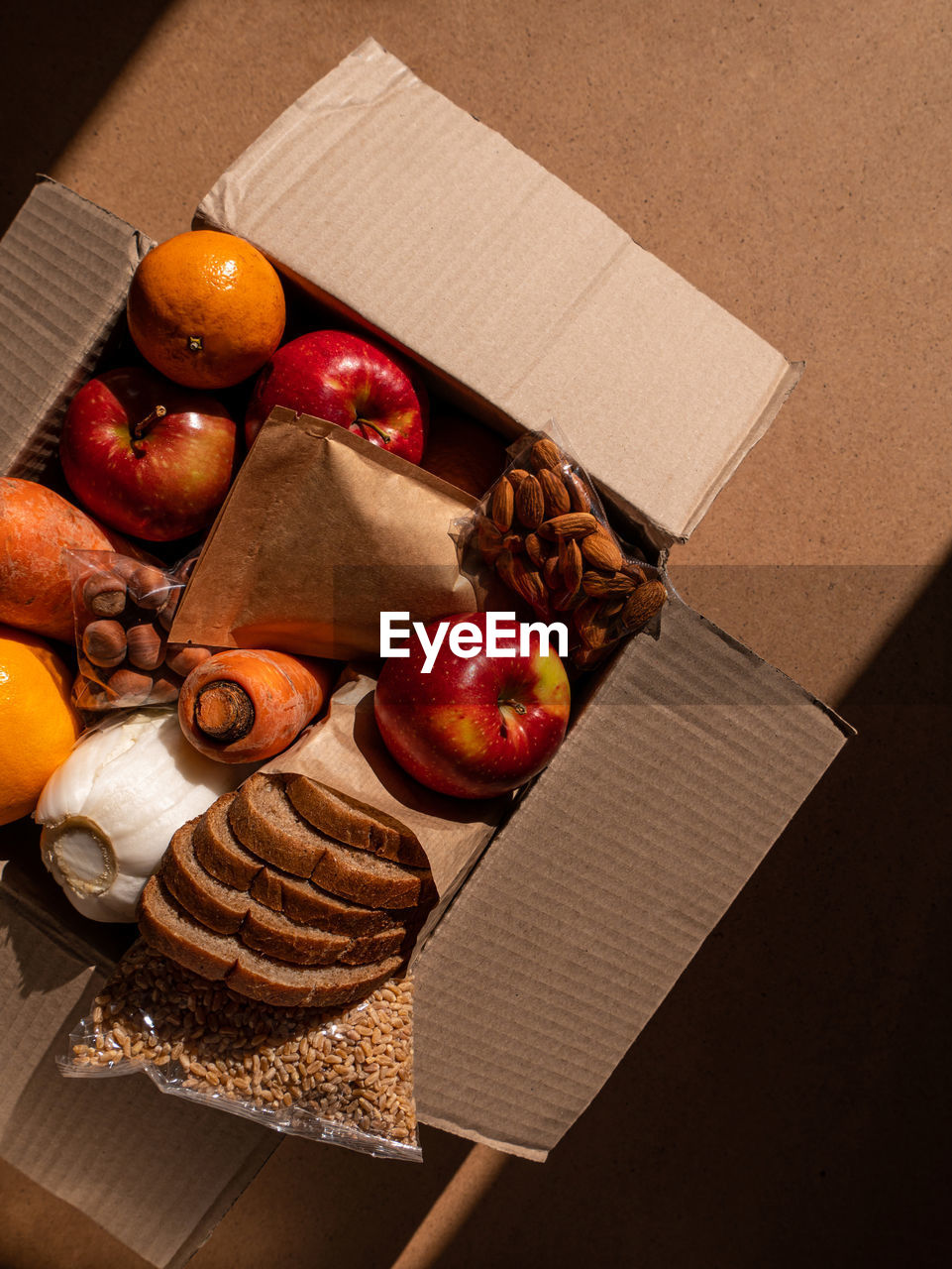 Healthy food delivery box with harsh shadow new normal online shopping supermarket take away service