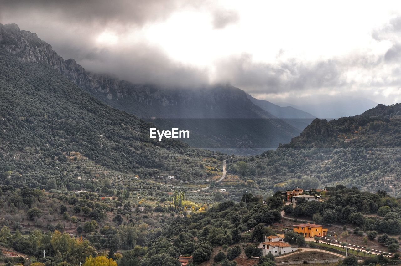 Scenic view of mountains against sky at night