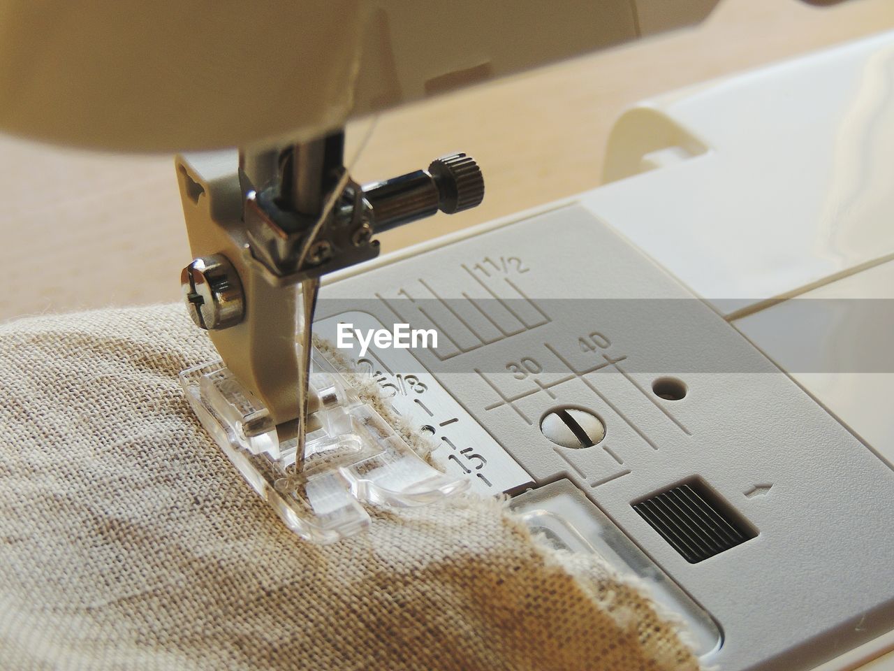 High angle view of burlap on sewing machine