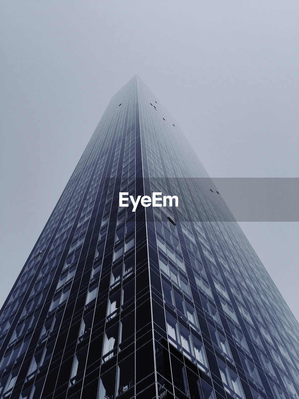 Low angle view of modern building against clear sky