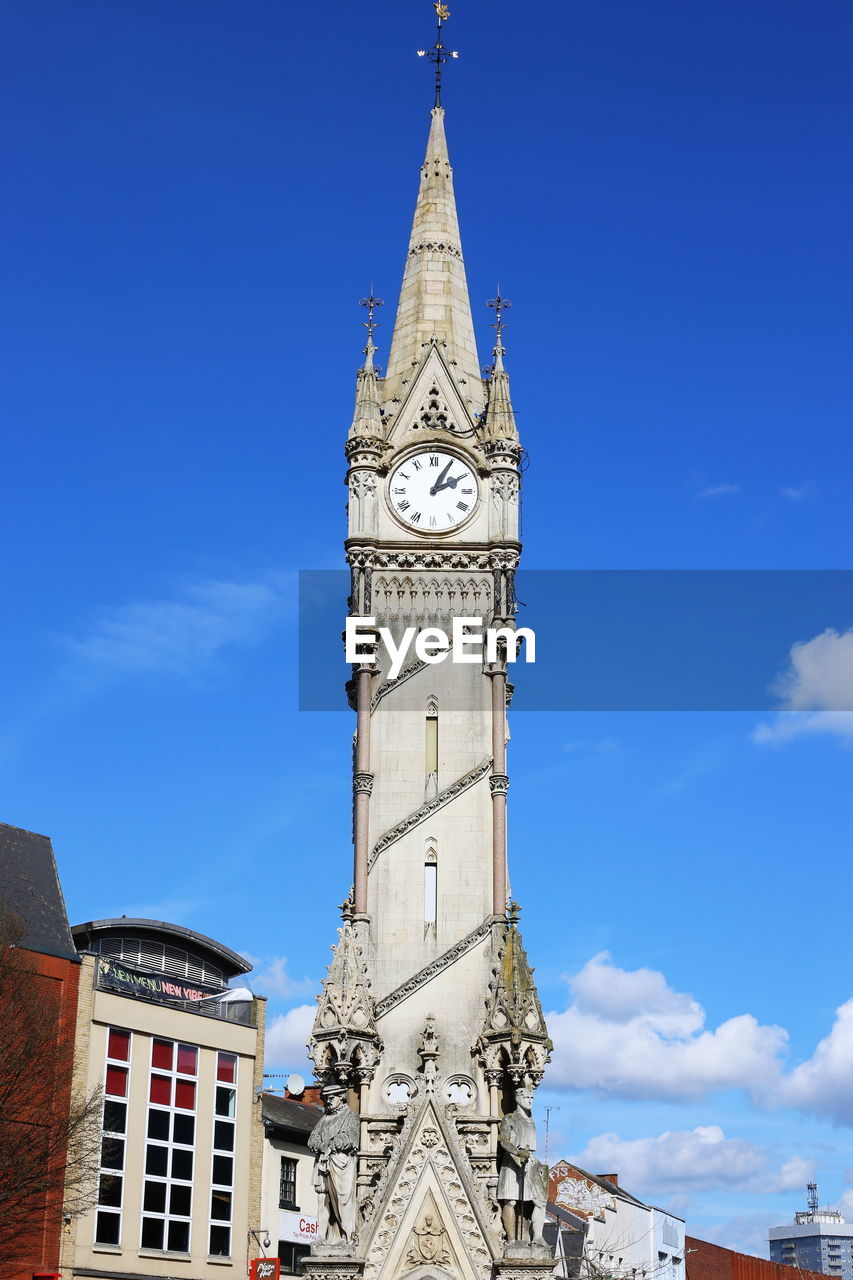 LOW ANGLE VIEW OF CLOCK TOWER