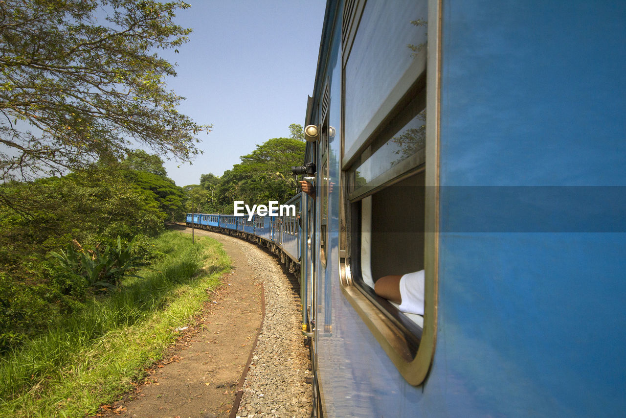 PANORAMIC VIEW OF TRAIN AGAINST SKY