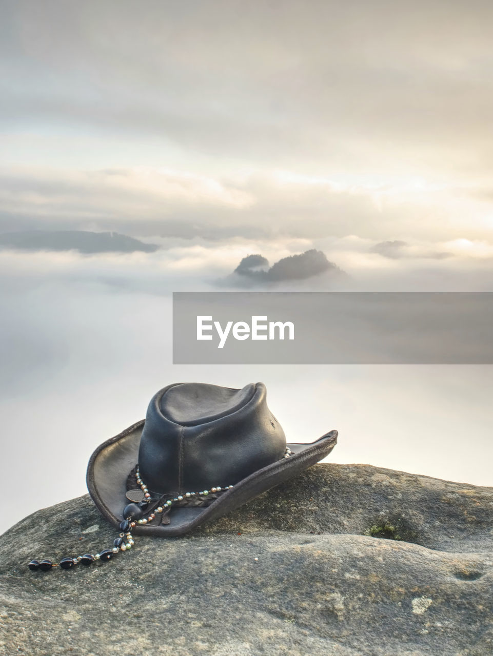 Wild west. traditional american cowboy hat. misty rocky mountains. texas rodeo style