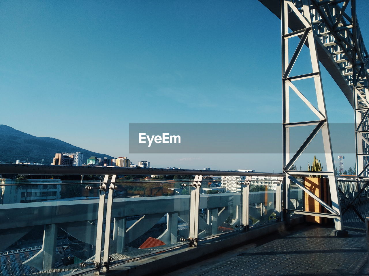 BRIDGE OVER BAY AGAINST CLEAR SKY