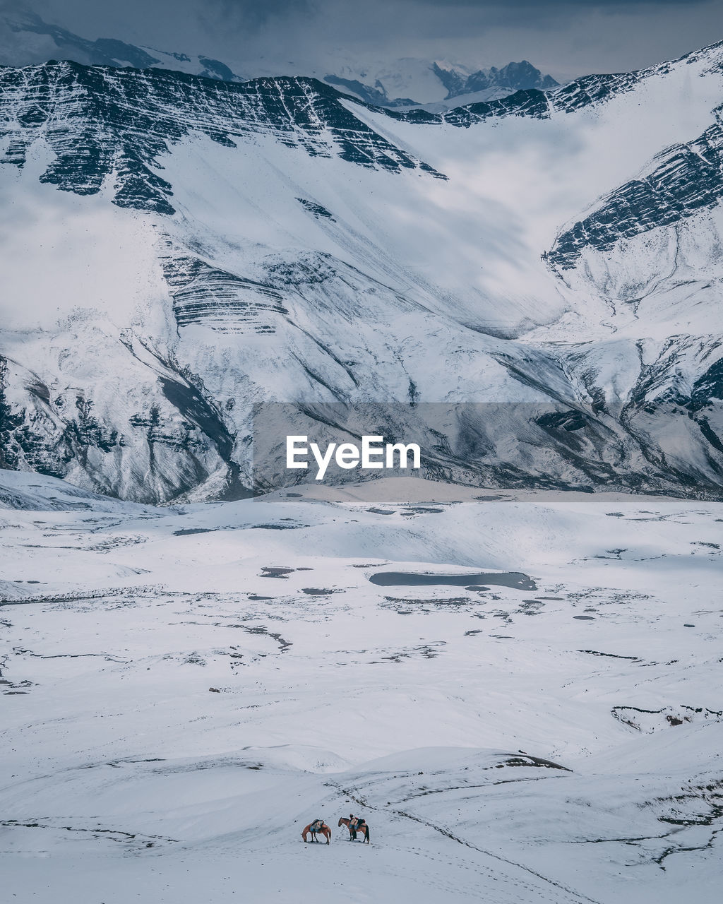 Scenic view of snow covered mountains