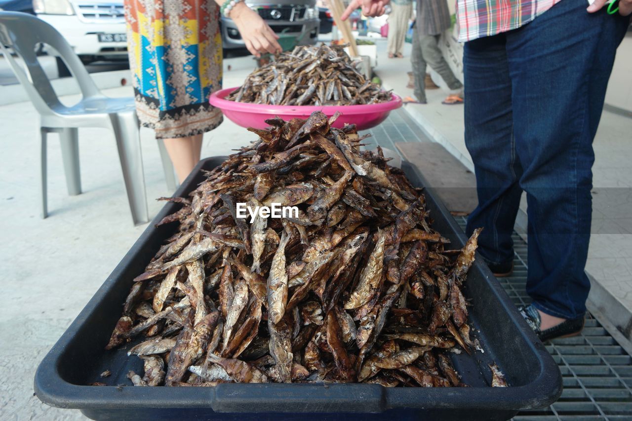 Close-up of salted fish for sale in market