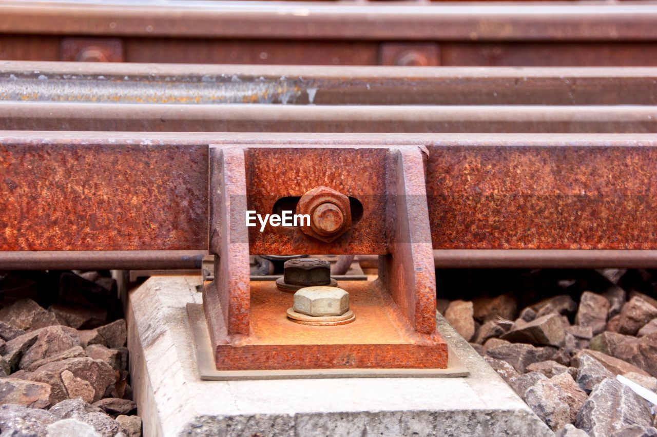 Close-up of machine part of railroad track