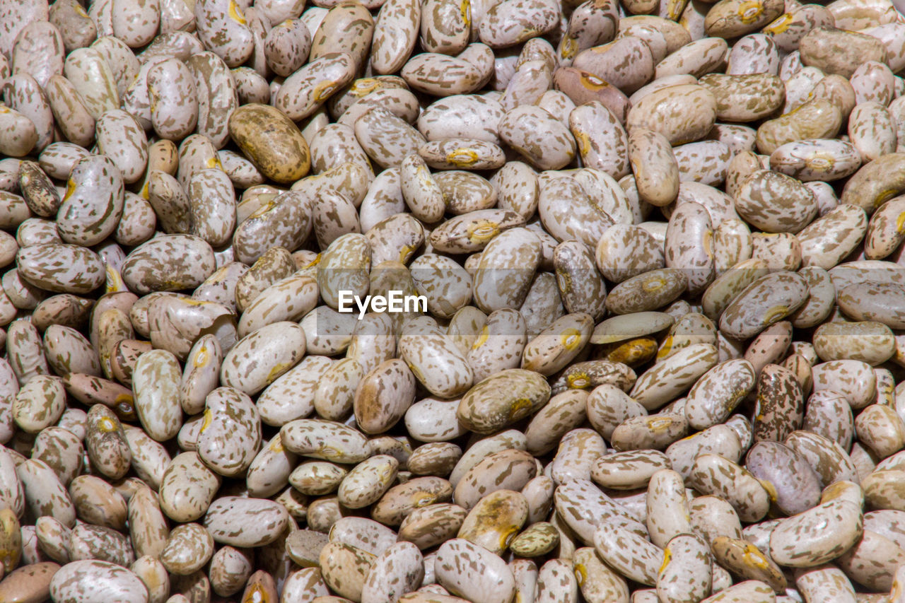 FULL FRAME SHOT OF PEBBLES AT MARKET STALL