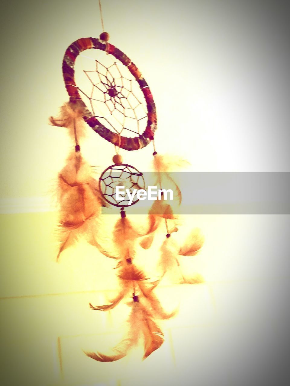 dreamcatcher, hanging, feather, luck, spirituality, vignette, indoors, hope, no people, close-up, day