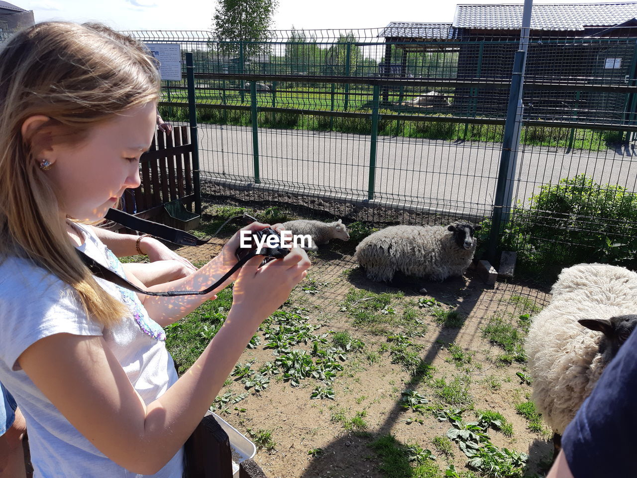 Woman looking at camera in zoo