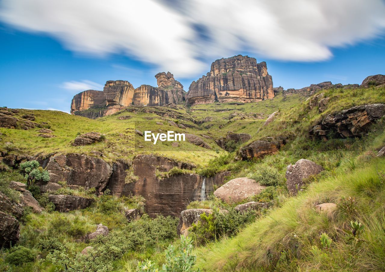 Panoramic view of rock formations against sky