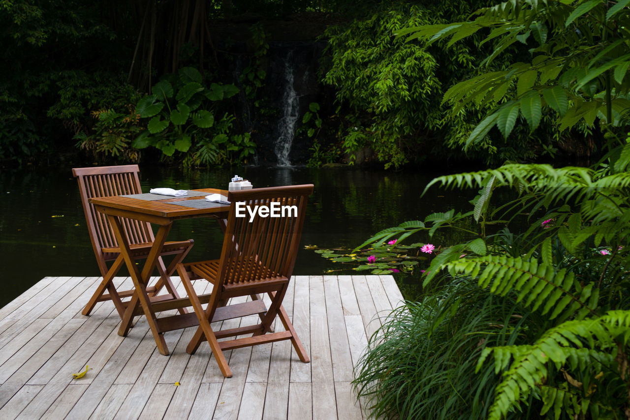 Table and chairs in the tropical surroundings