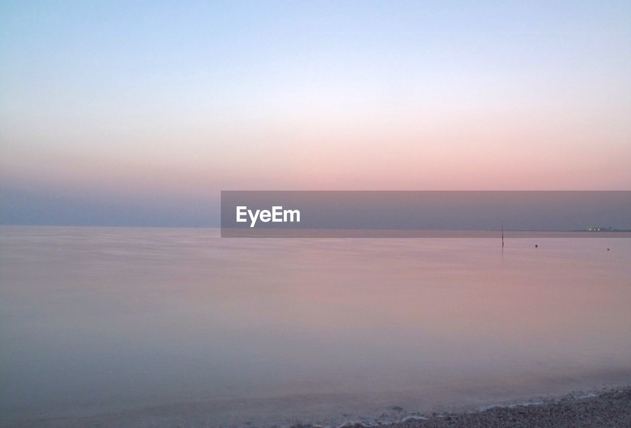 Scenic view of sunset at beach