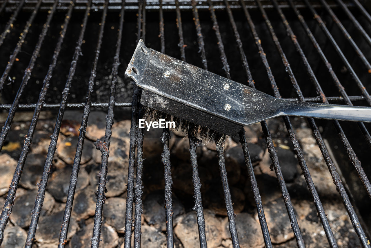 iron, metal, no people, barbecue grill, grid, metal grate, barbecue, grate, close-up, high angle view, day, nature, outdoors