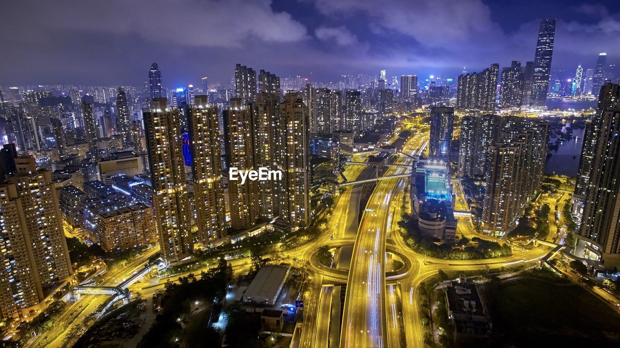 High angle view of illuminated cityscape at night