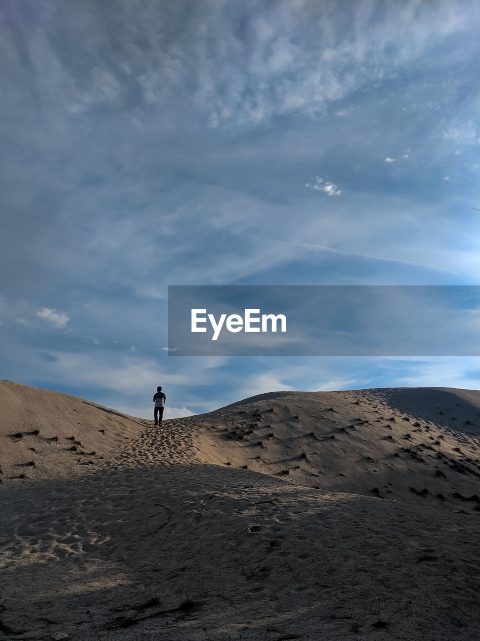 Scenic view of desert against sky