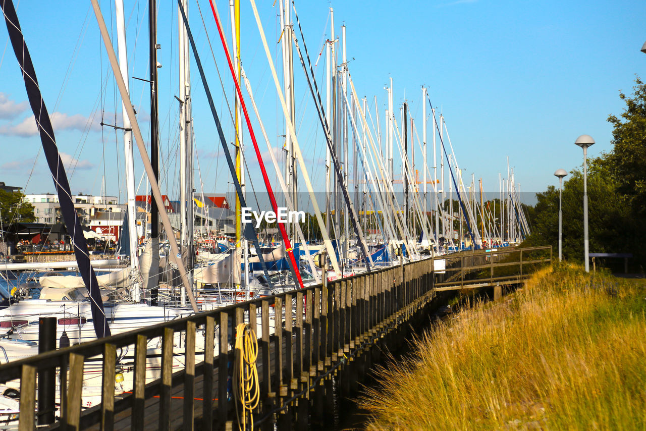 Boats moored on sea at harbor