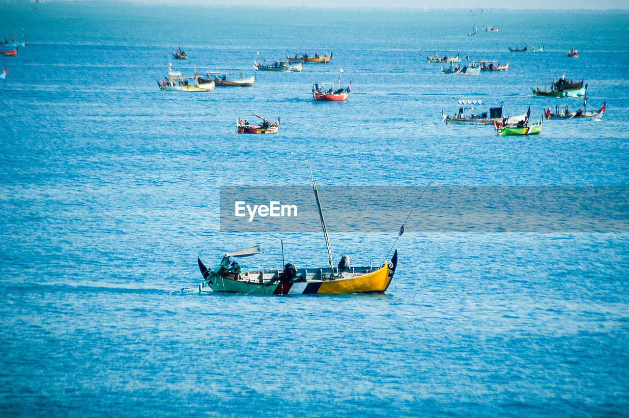 Boats in blue sea