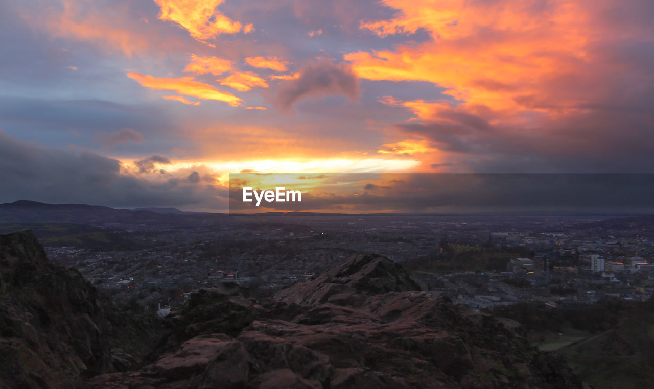 HIGH ANGLE VIEW OF CITY BUILDINGS DURING SUNSET