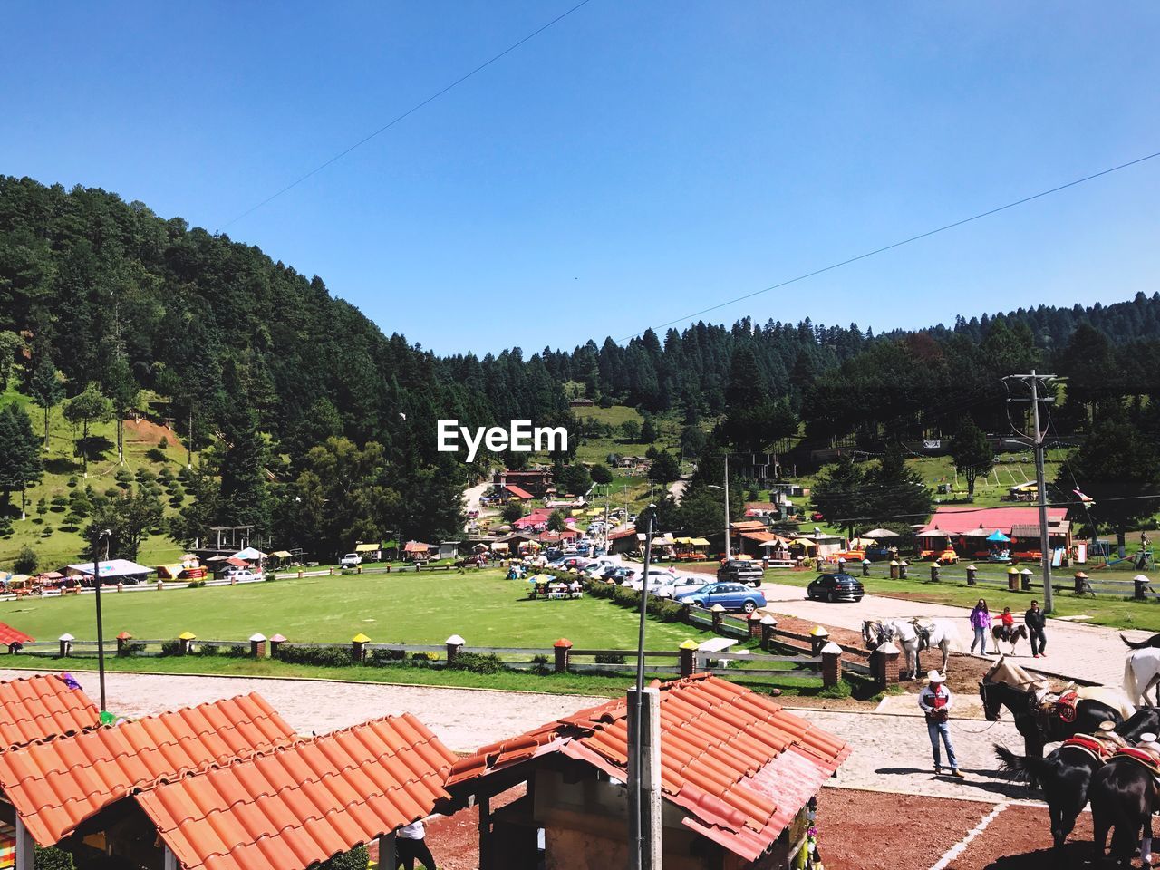 High angle view of people in park against clear sky