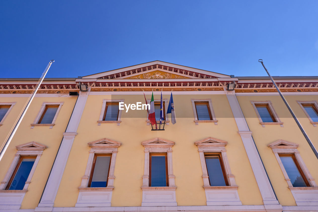 architecture, building exterior, built structure, facade, sky, window, building, blue, low angle view, clear sky, no people, nature, city, day, travel destinations, house, outdoors, history, the past, travel, sunny, roof