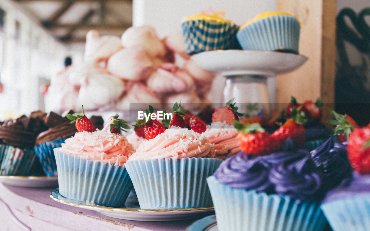 Close-up of cupcakes on table