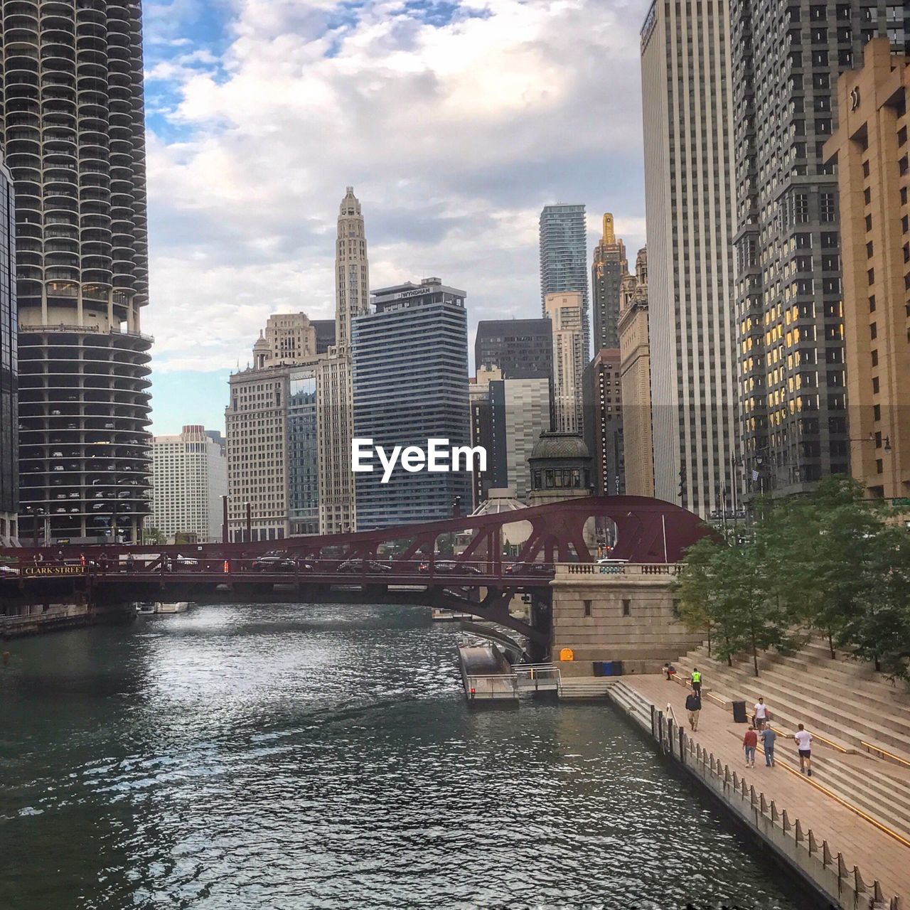 View of bridge over river with buildings in background