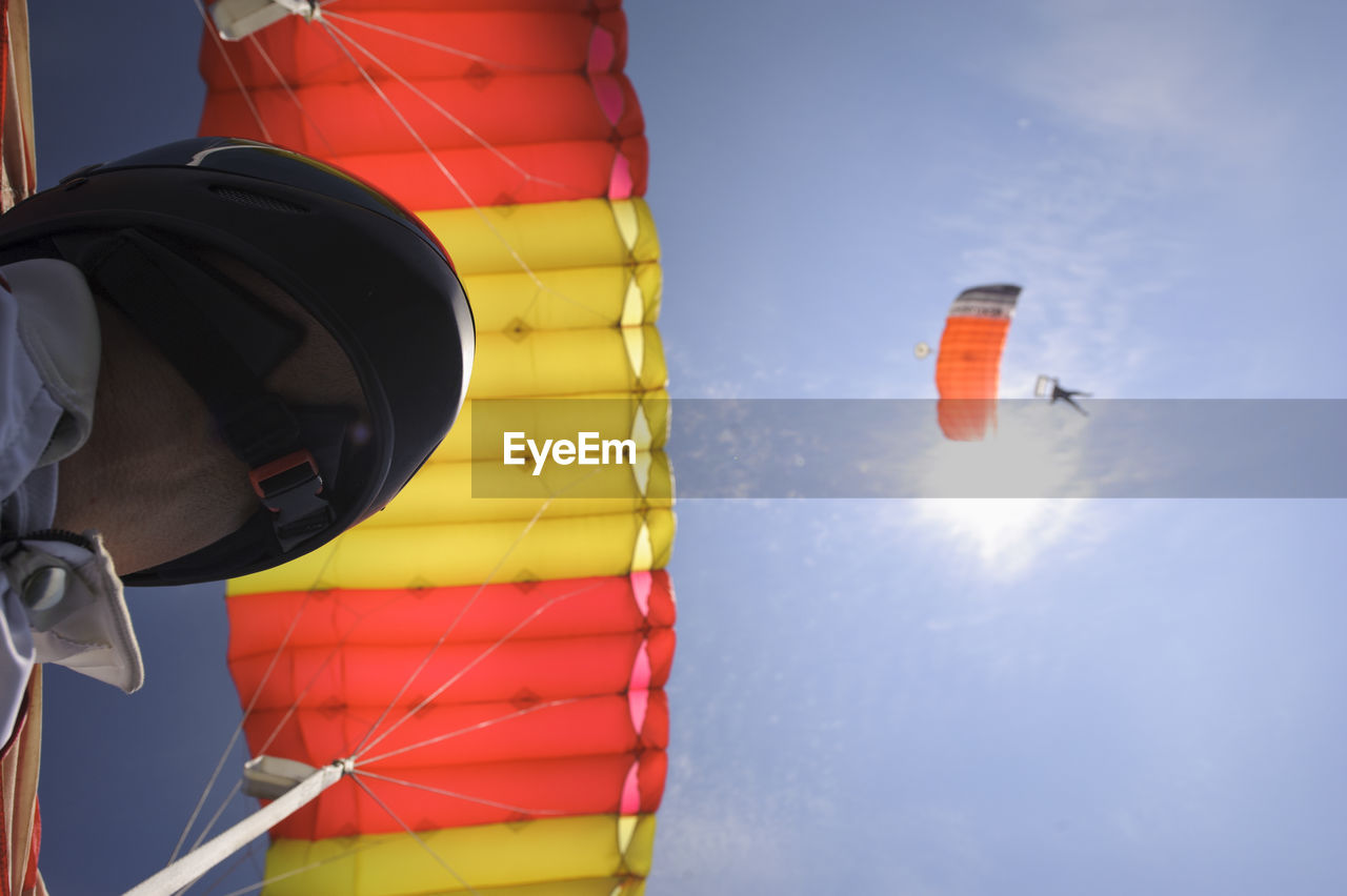 Paragliders, low angle view