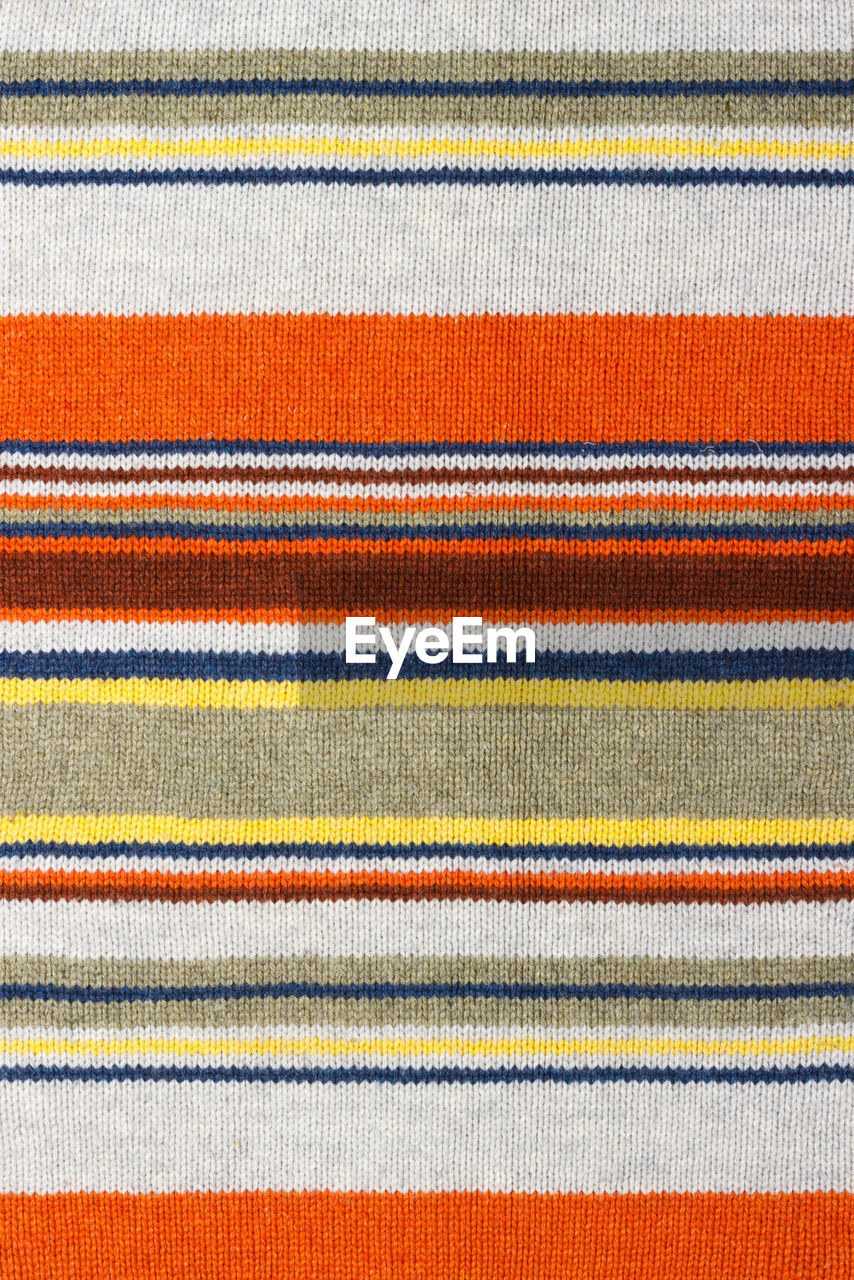 Colorful stripy mohair woolen fabric texture close up. fabric multicolor background