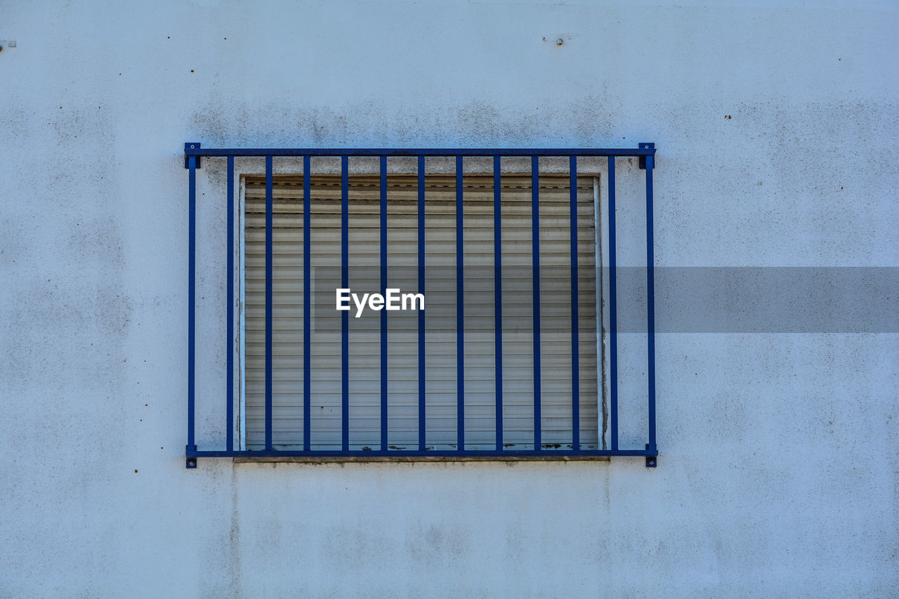 Closed window of old building