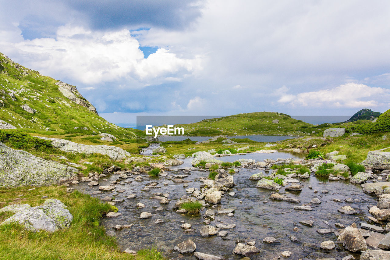 Scenic view of rocks against sky