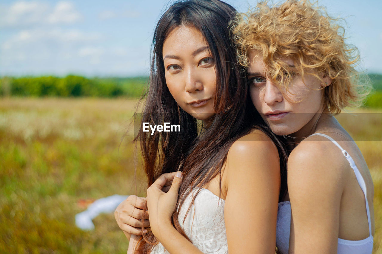 Portrait of young women different race outdoor