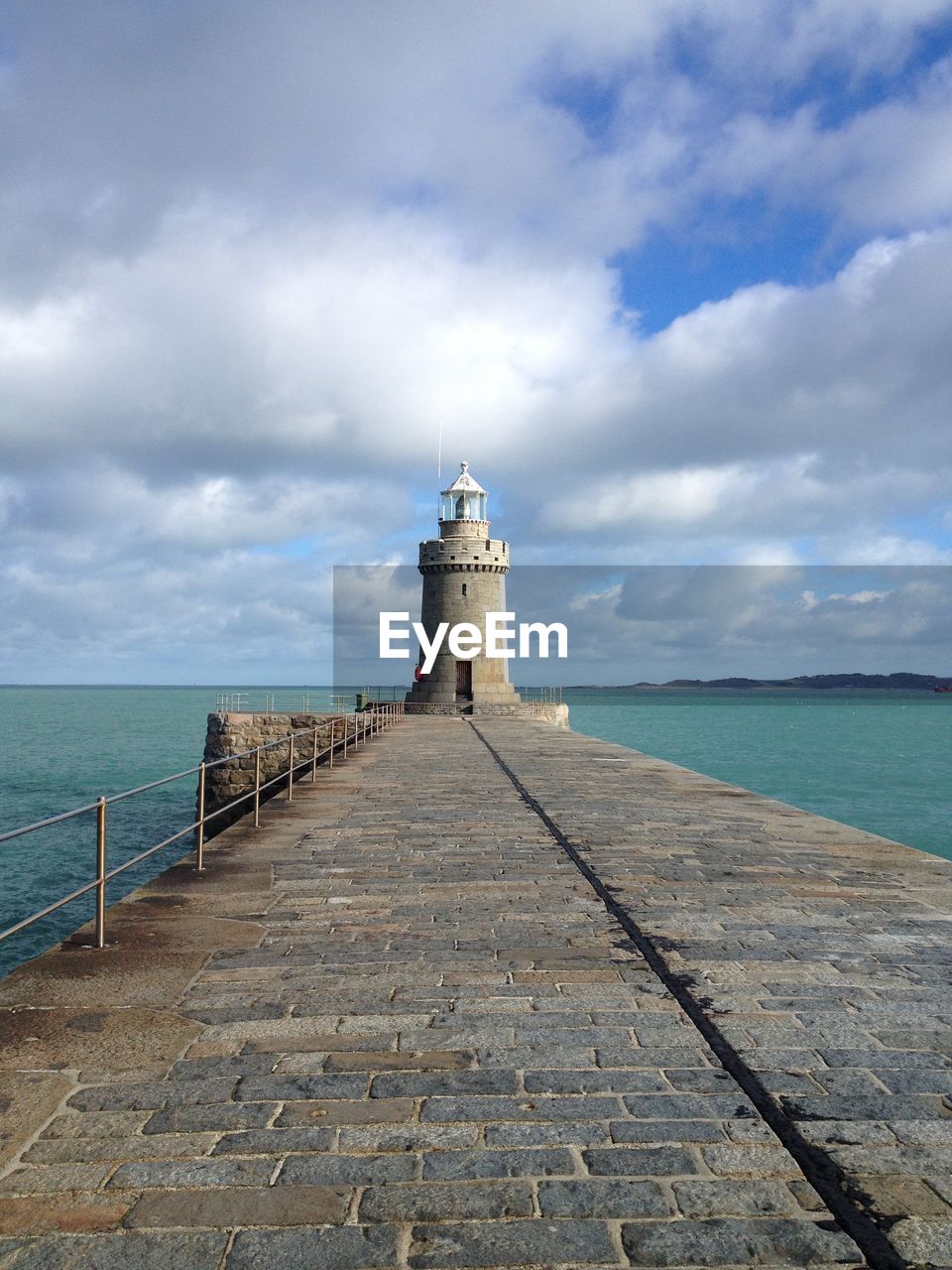 LIGHTHOUSE AGAINST SEA