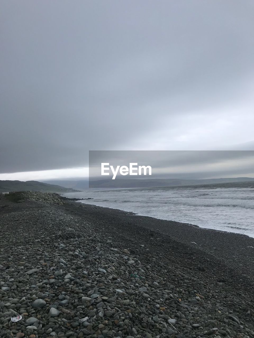 BEACH AGAINST SKY