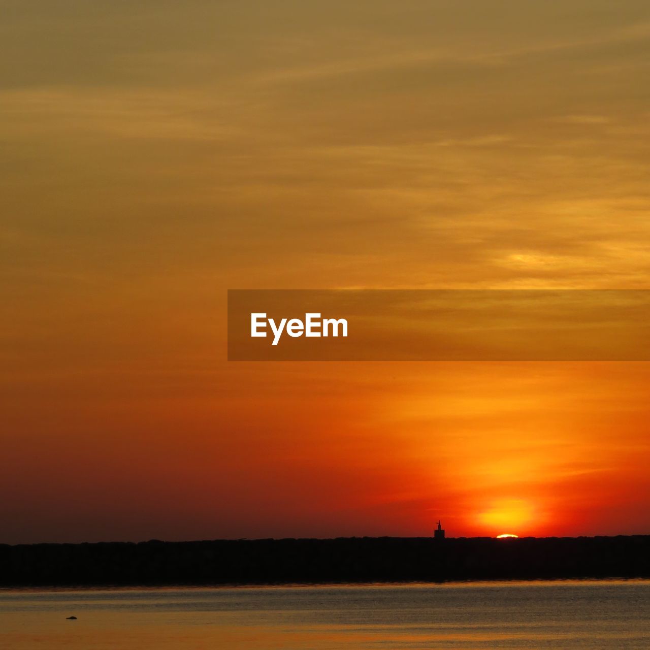 Scenic view of dramatic sky during sunset