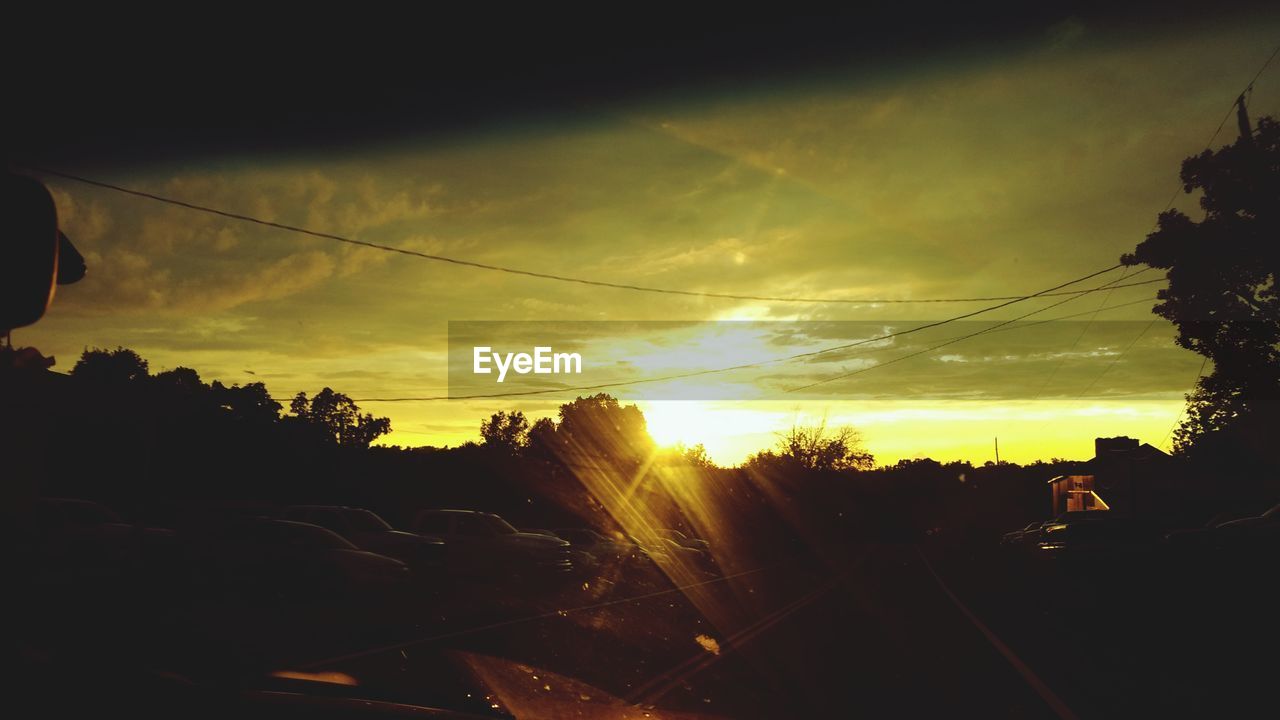 SILHOUETTE LANDSCAPE AGAINST SKY DURING SUNSET