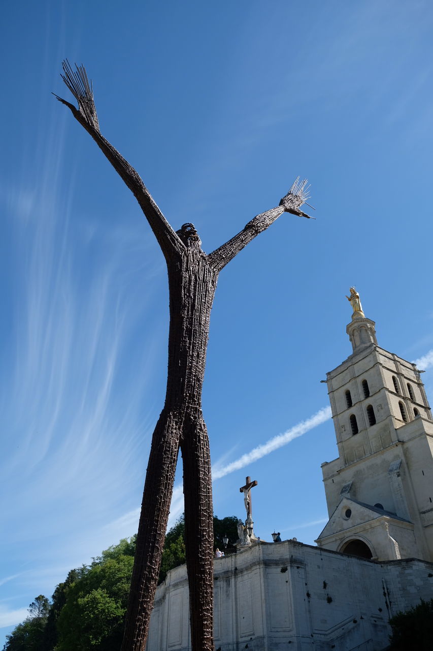 LOW ANGLE VIEW OF CROSS AGAINST BLUE SKY