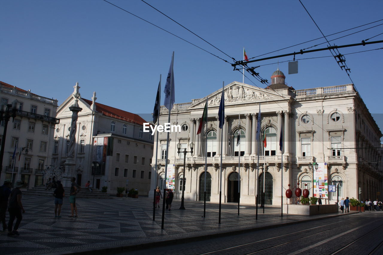 BUILDINGS AGAINST CLEAR SKY