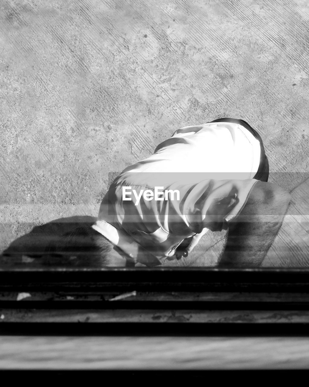 DIRECTLY ABOVE SHOT OF TWO PEOPLE ON TILED FLOOR