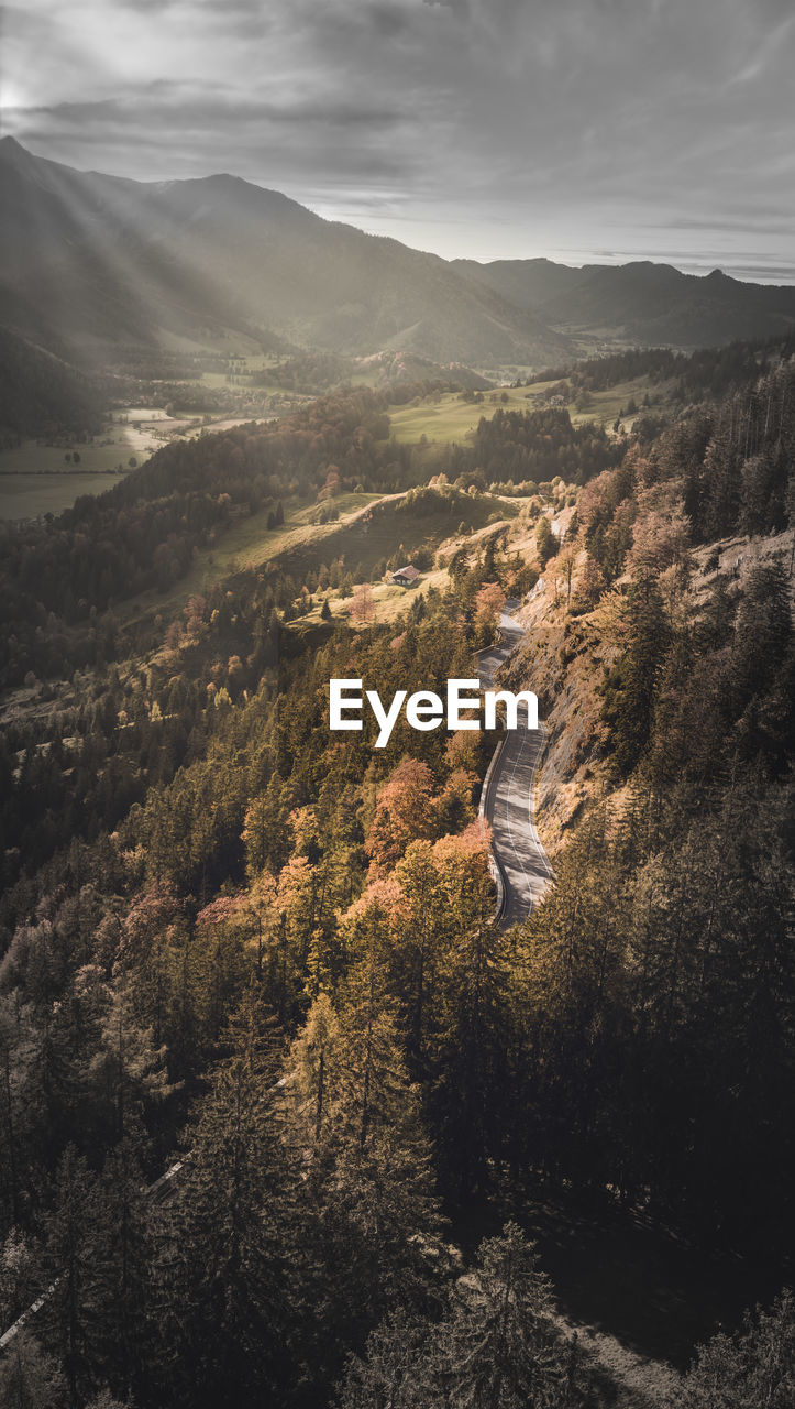 High angle view of landscape against sky with mountain street